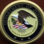 Departamento de Justicia EE.UU logo